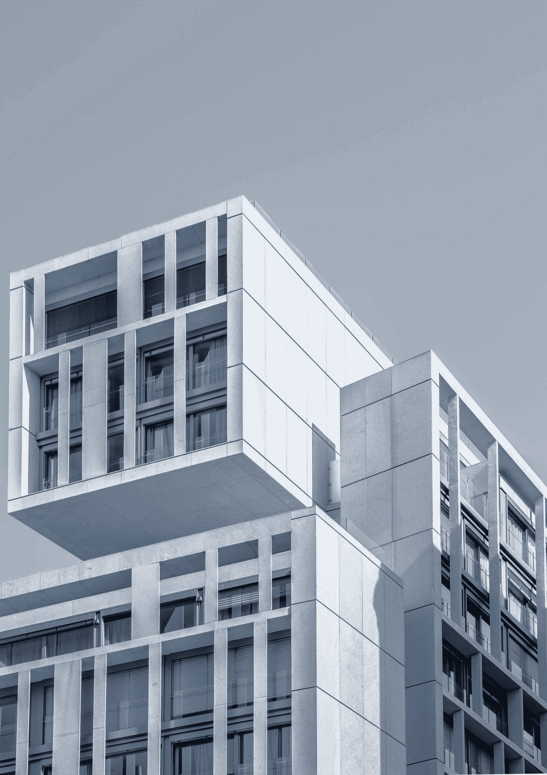 Brick apartment facade in flat afternoon light