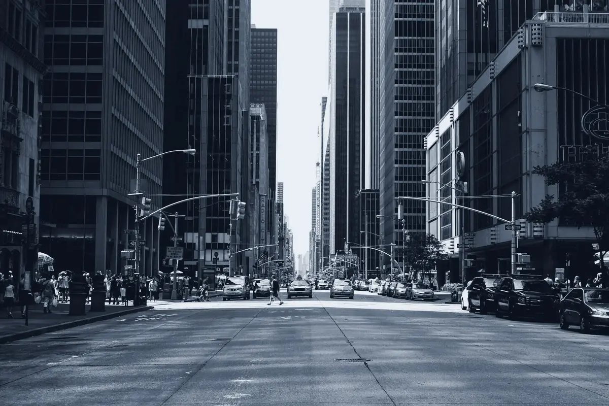 City avenue lined with buildings, seen down the centerline